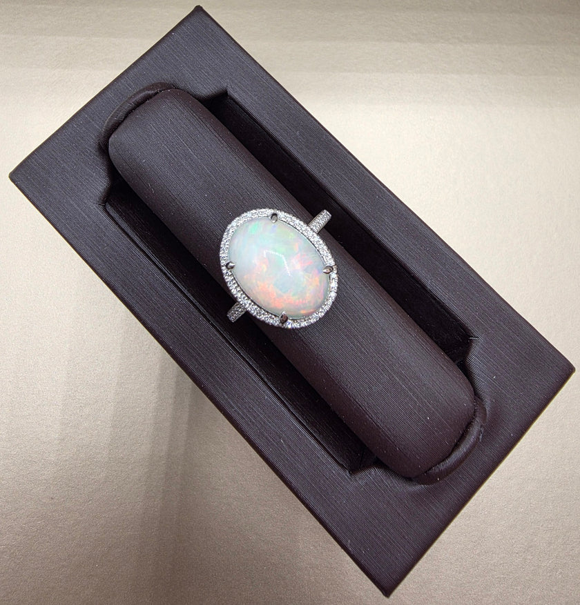 Fiery Oval Shape Opal and Pave Diamond Halo Ring in 14K White Gold