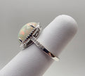 Fiery Oval Shape Opal and Pave Diamond Halo Ring in 14K White Gold