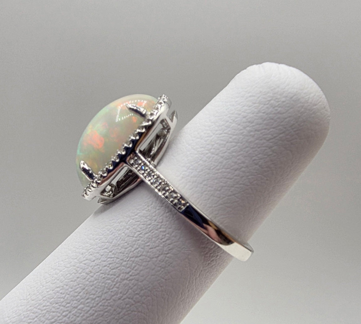 Fiery Oval Shape Opal and Pave Diamond Halo Ring in 14K White Gold