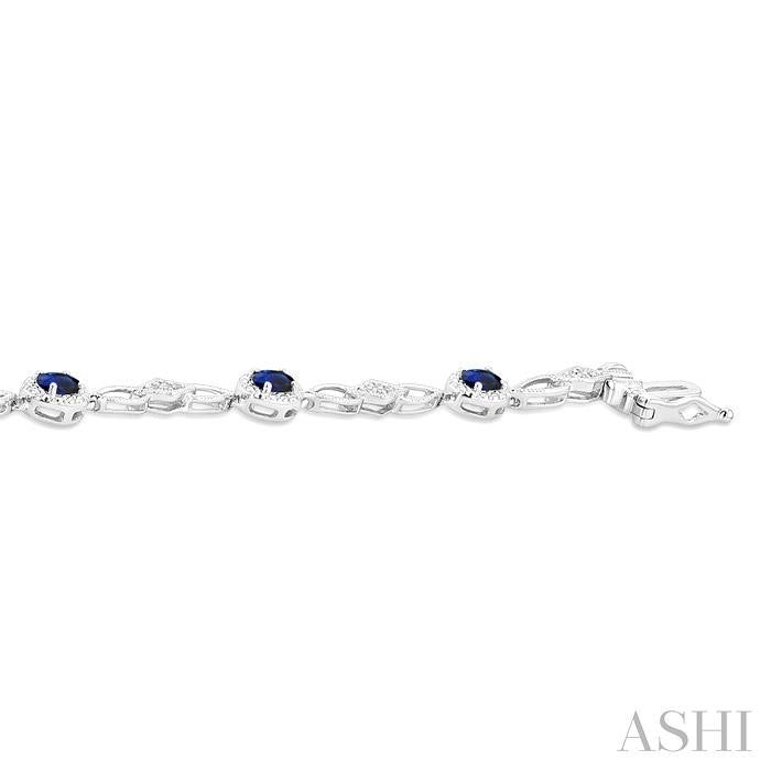 Striking Sapphire and Diamond Precious Fashion Bracelet in 10K White Gold