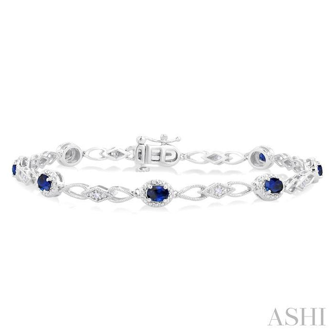 Striking Sapphire and Diamond Precious Fashion Bracelet in 10K White Gold