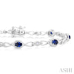 Striking Sapphire and Diamond Precious Fashion Bracelet in 10K White Gold