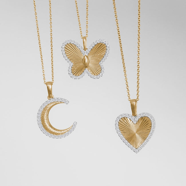 Heart shape fluted diamond fashion pendant