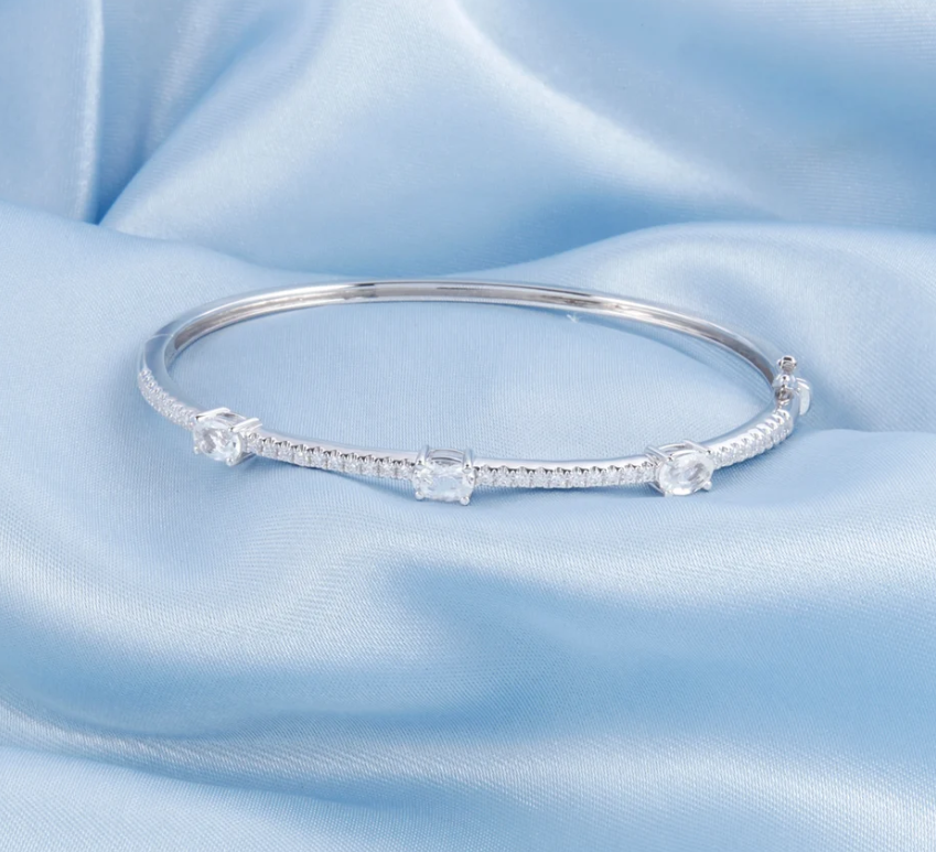 Gorgeous Oval and Pave Diamond Station Bangle in 18K White Gold