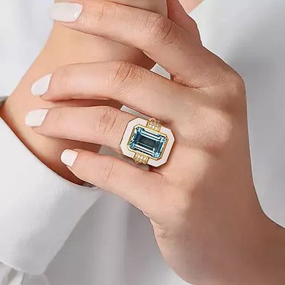 14K Yellow Gold Diamond and Blue Topaz Emerald Cut Ladies Ring With Flower Pattern J-Back and White Enamel