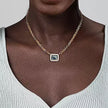 14K Yellow Gold Diamond and Blue Topaz Emerald Cut Necklace With Flower Pattern J-Back and White Enamel