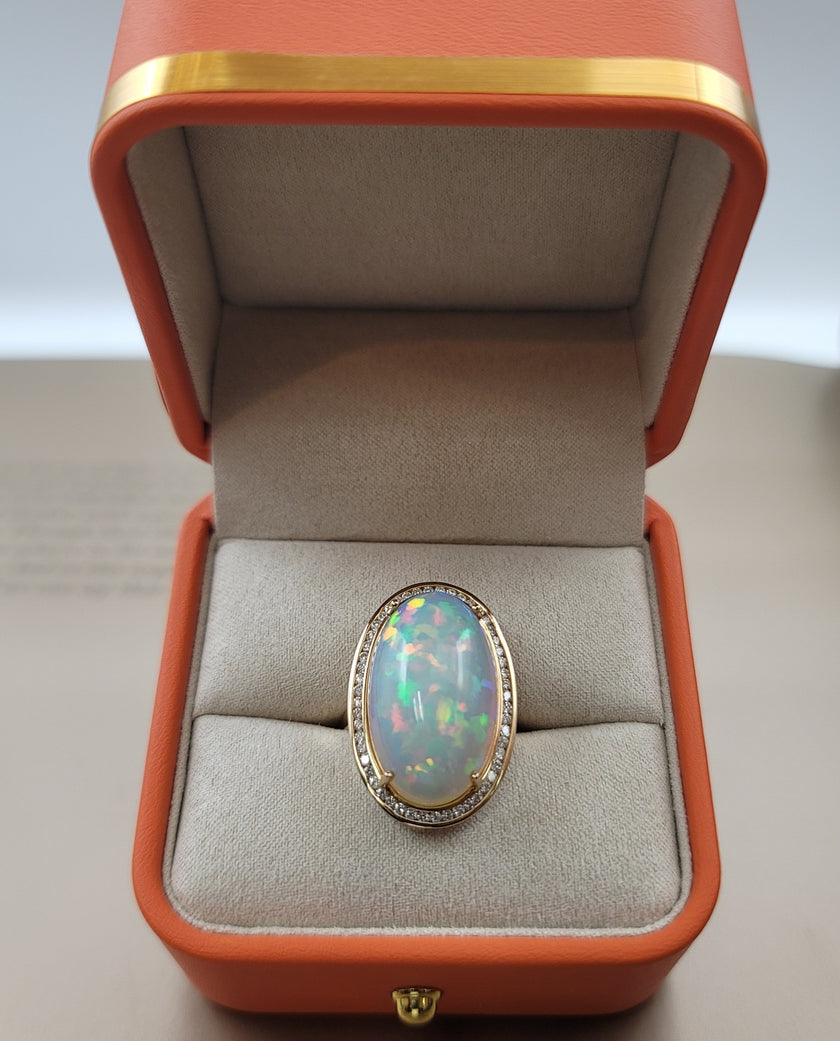 Gorgeous Diamond Ring with an Amazing 17 Carat Opal in 14K Yellow Gold  | Gemma's Jewelers 