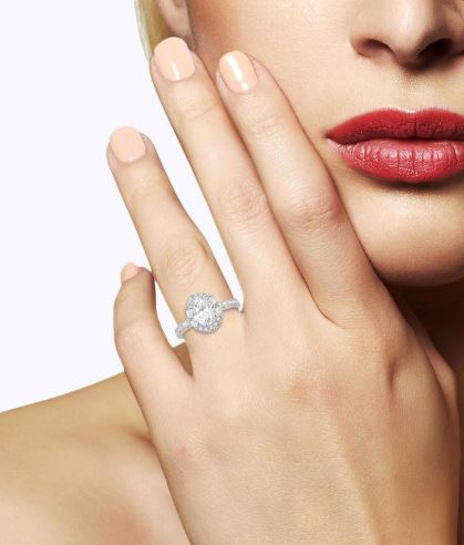 Opulent Oval Shape Diamond Engagement Ring with Baguettes in 14K White Gold | Gemma's Jewelers