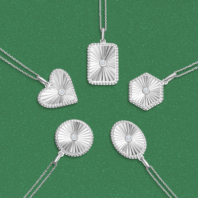 1/20 Ctw Heart fluted medallion Round Cut Diamond Pendant With Chain in Sterling Silver