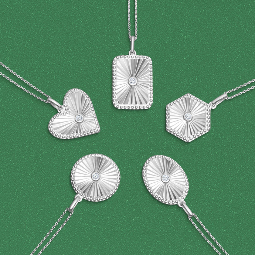 1/20 Ctw Heart fluted medallion Round Cut Diamond Pendant With Chain in Sterling Silver