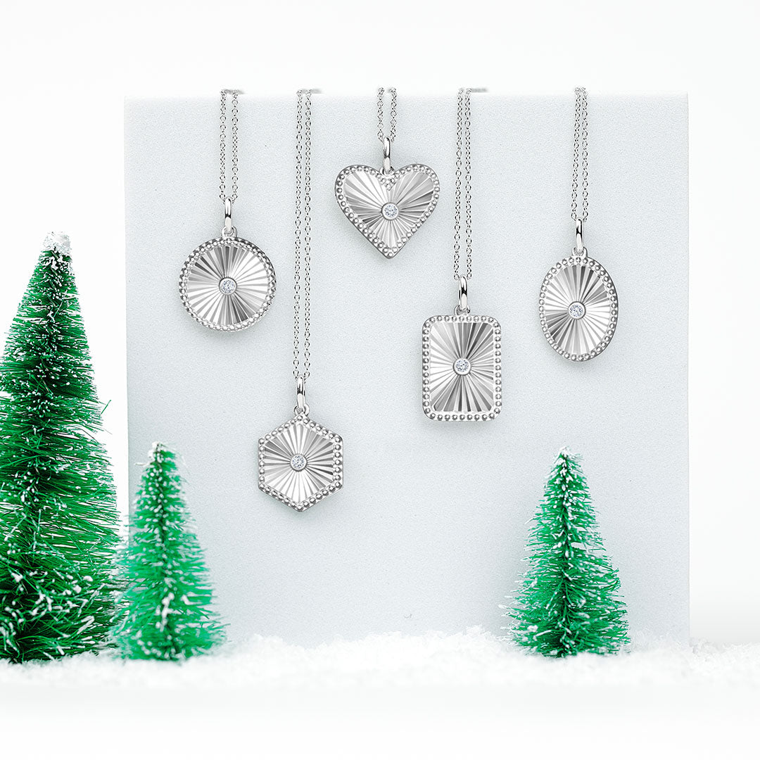 1/20 Ctw Heart fluted medallion Round Cut Diamond Pendant With Chain in Sterling Silver