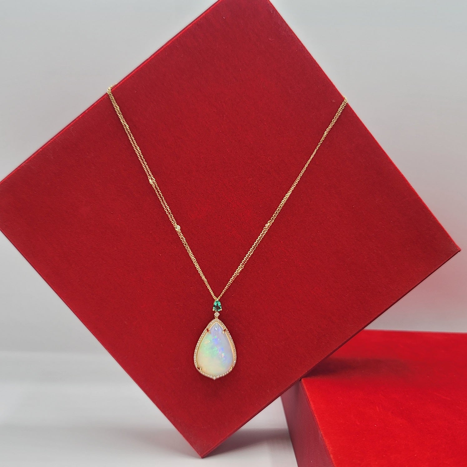 Scintillating Diamond and Monumental Opal Necklace with Gorgeous Emerald in 14K Gold  | Gemma's Jewelers