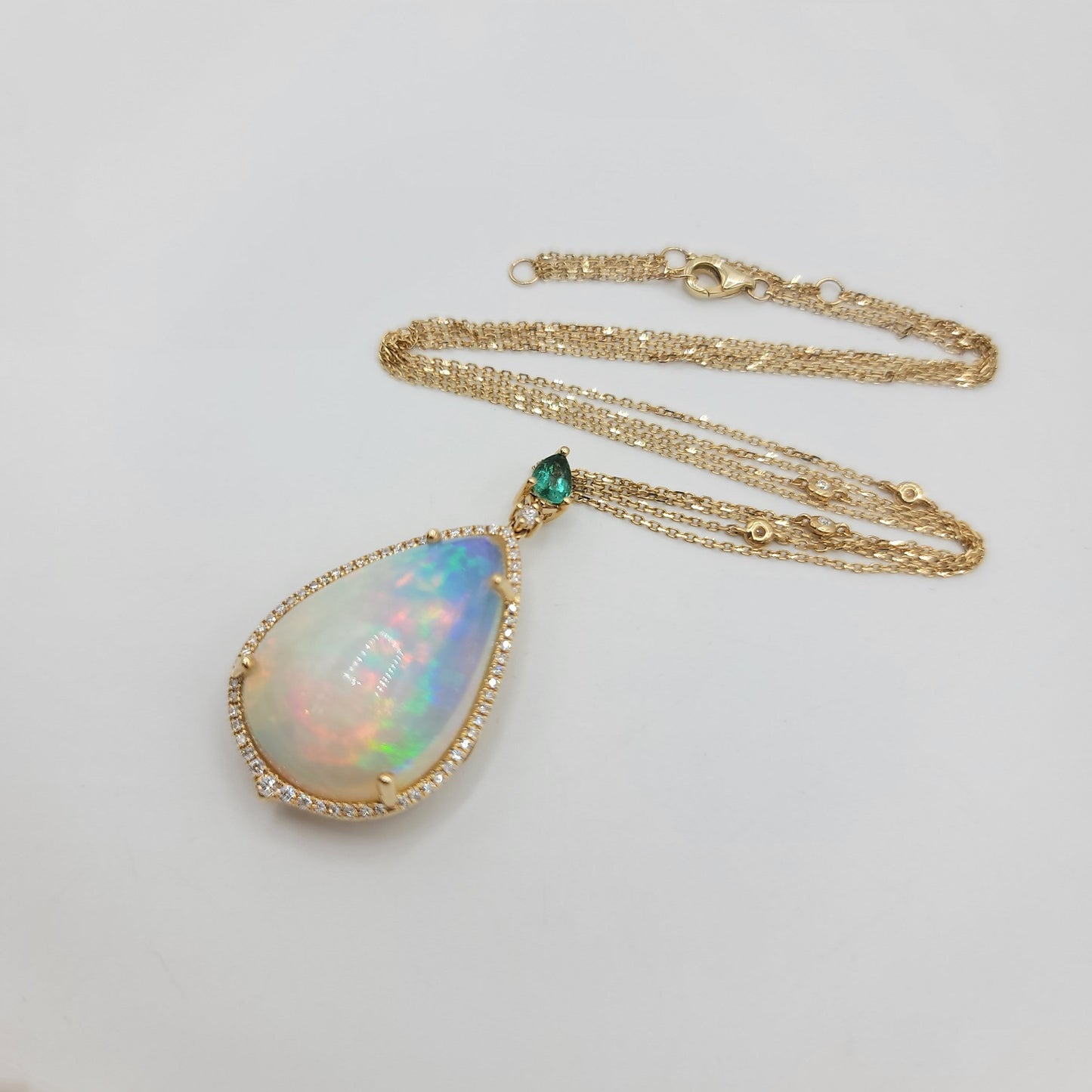 Scintillating Diamond and Monumental Opal Necklace with Gorgeous Emerald in 14K Gold  | Gemma's Jewelers