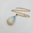 Scintillating Diamond and Monumental Opal Necklace with Gorgeous Emerald in 14K Gold  | Gemma's Jewelers