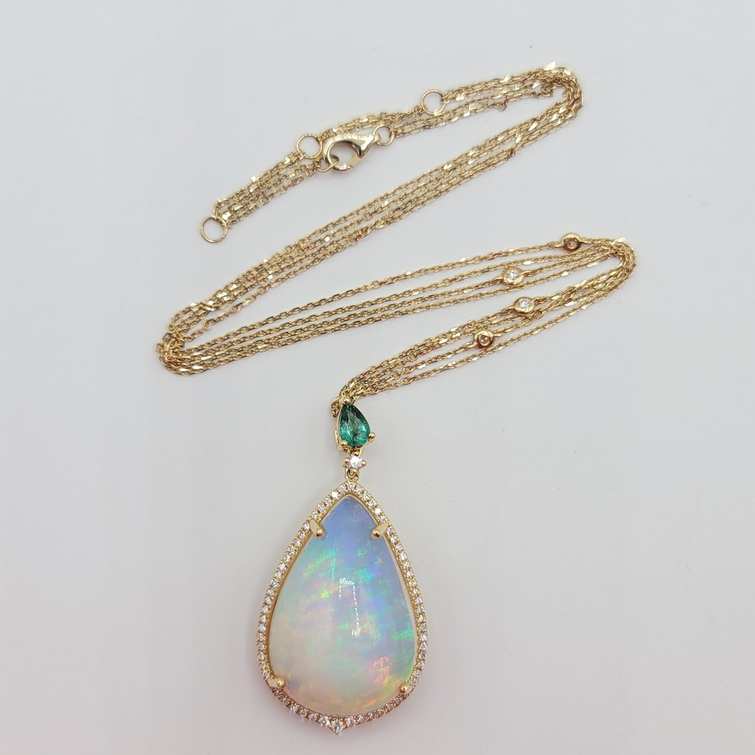 Scintillating Diamond and Monumental Opal Necklace with Gorgeous Emerald in 14K Gold  | Gemma's Jewelers